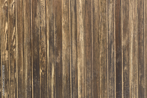 Beautiful old wall background from dun wood boards.