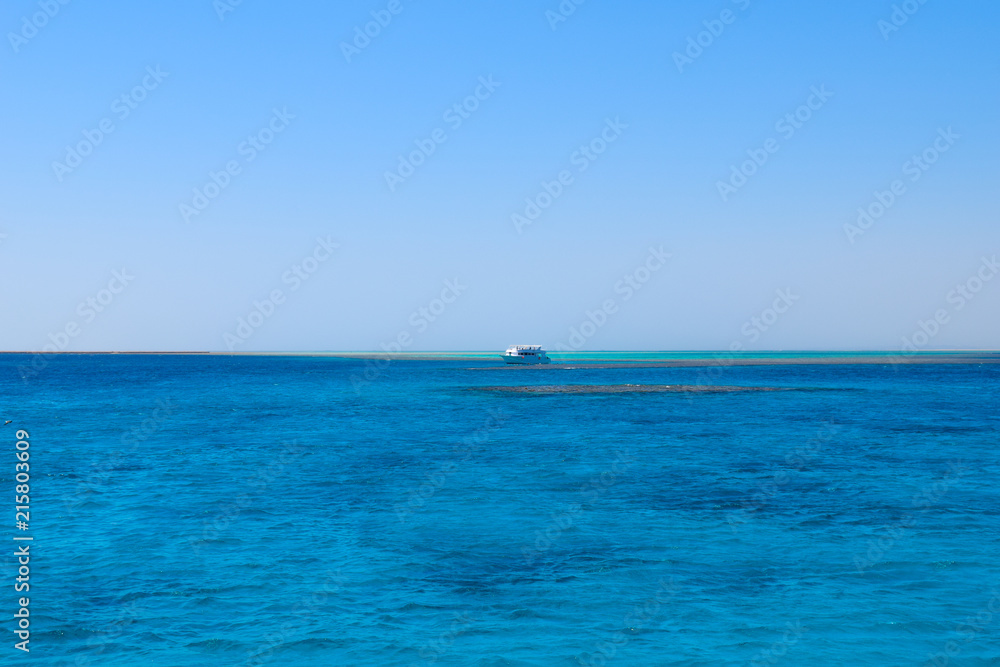 ship sailing on the ocean, beautiful turquoise water and blue sky ship sailing on the ocean, beautiful turquoise water and blue sky