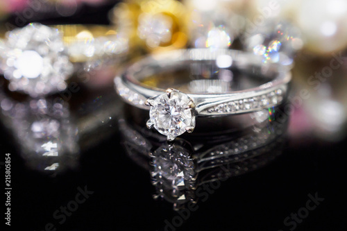 Jewelry diamond rings with reflection on black background