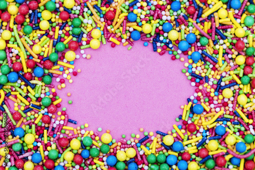 Colourful candy cake decorative sprinkles background