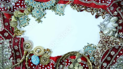 Beautiful Indian Sari Clothing with Bridal jewelry. Frame for wedding invitation.  Oriental Fashion.