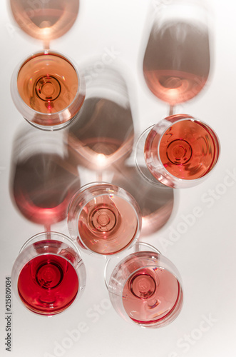 Wallpaper Mural Glasses of white and pink wine with their shadows Torontodigital.ca