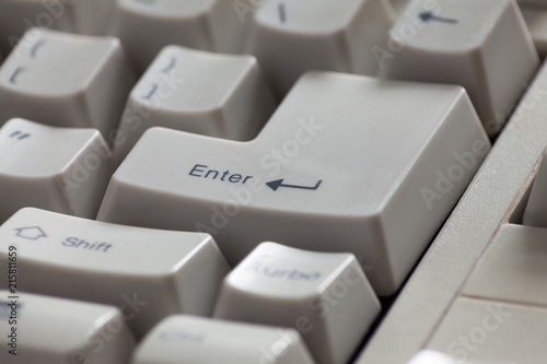 Old computer keyboard close-up. Focused on Enter key