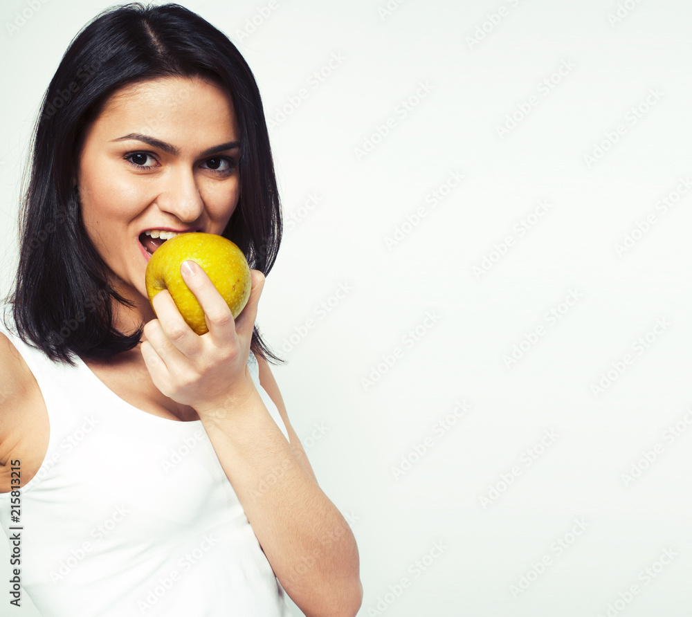 pretty young real tenage girl eating apple close up smiling, wom pretty young real tenage girl eating apple close up smiling, wom