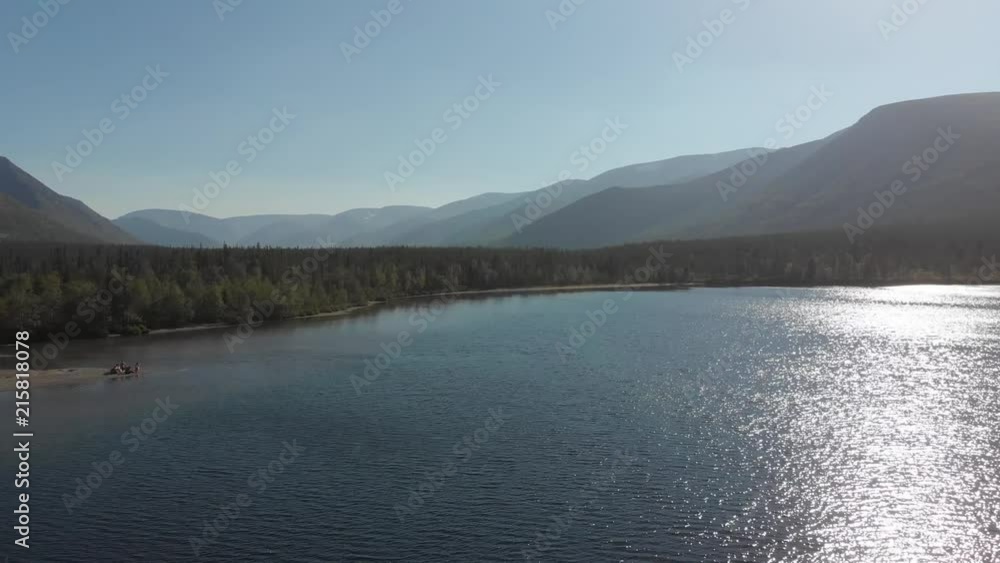 Helicopter Aerial View of lakes at the foot of mountains Helicopter Aerial View of lakes at the foot of mountains