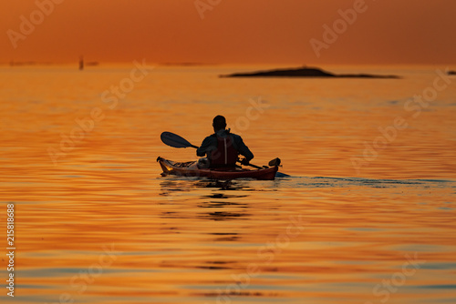 Kayak in sunset at sea © Florin Andrei