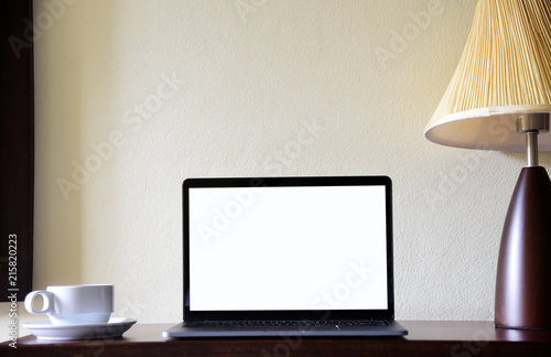 Working with Laptop computer and Hot coffee copy space on desk background Interior Concept