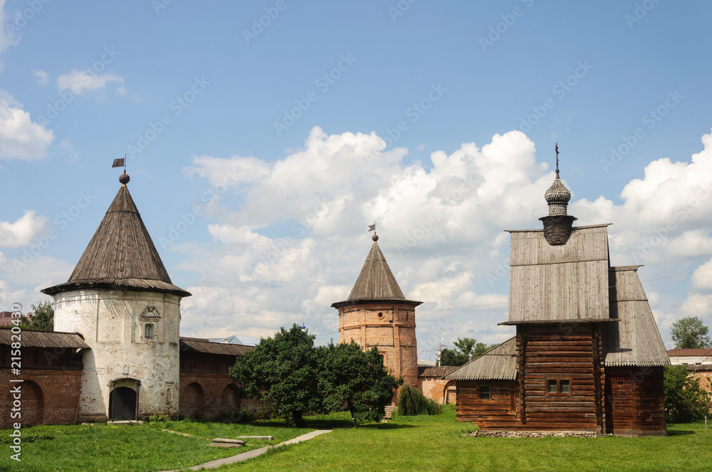 Walls and towers of ancient Russian monastery in Yuriev-Polsky
