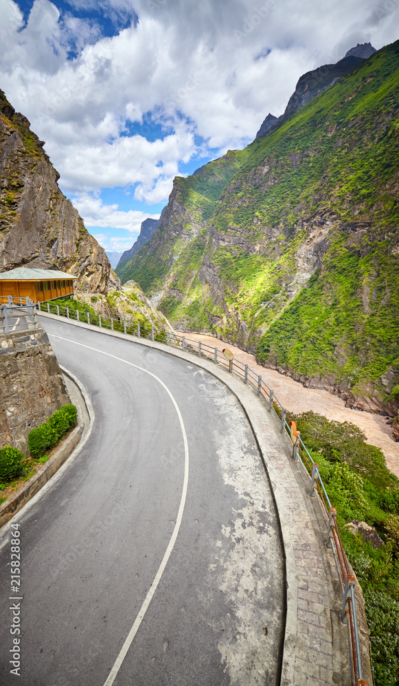 Scenic mountain road by the Tiger Leaping Gorge, China.