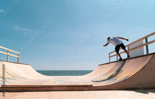 the guy skates on a ramp