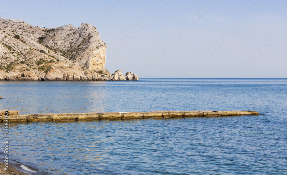Landscape with blue sea, sky and rocks on the black sea Bay.Crimea.