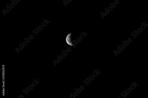 moon eclipse. red moon with eclipse, shadow of the earth that disappears leaving space to the moon illuminated by the sun © PAOLO