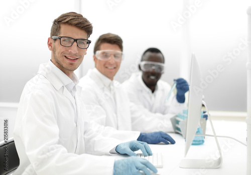 group of young scientists in the laboratory