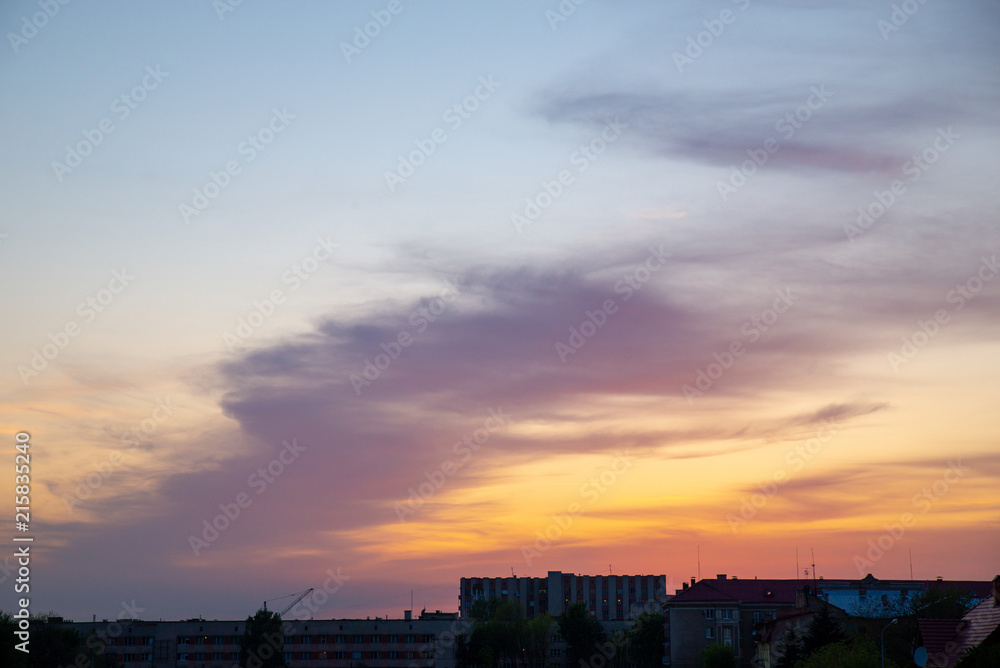 orange clouds with blue sky on sunset. copy space
