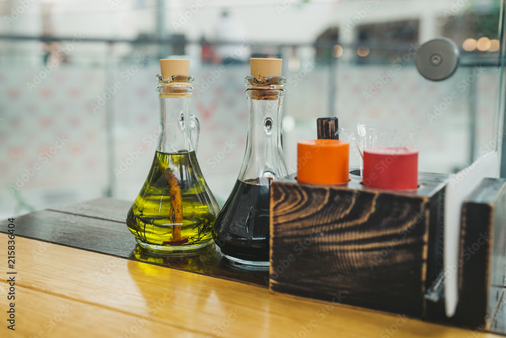 souses close up in bottles. cafe concept souses close up in bottles. cafe concept