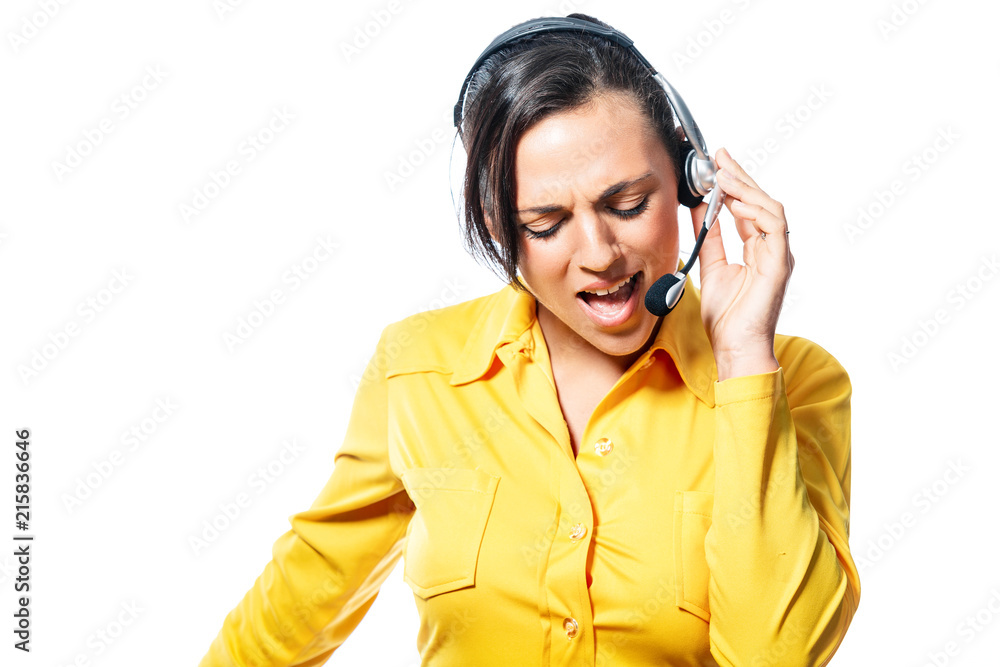 Argumentative call centre operator taking a call speaking into the microphone with a frown and gesticulating with her hand as she tries to make a point or explain isolated on white Argumentative call centre operator taking a call speaking into the microphone with a frown and gesticulating with her hand as she tries to make a point or explain isolated on white