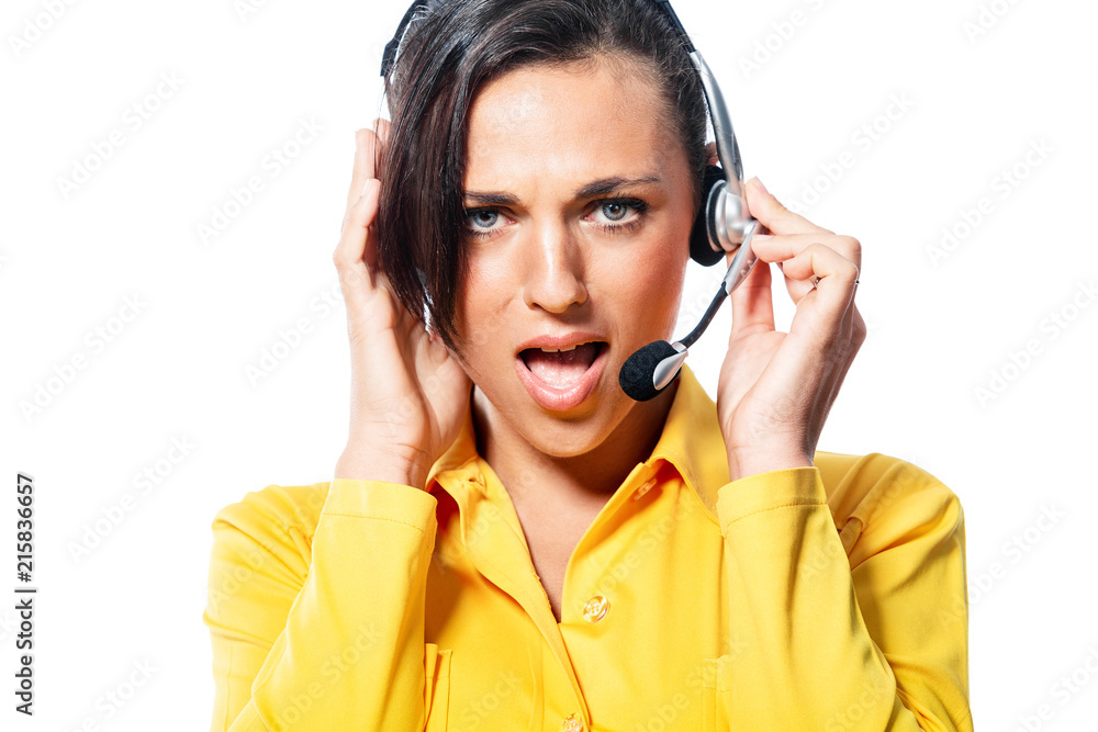 Argumentative call centre operator taking a call speaking into the microphone with a frown and gesticulating with her hand as she tries to make a point or explain isolated on white Argumentative call centre operator taking a call speaking into the microphone with a frown and gesticulating with her hand as she tries to make a point or explain isolated on white