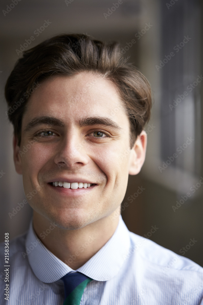 Close up head and shoulders of young white businessman Close up head and shoulders of young white businessman