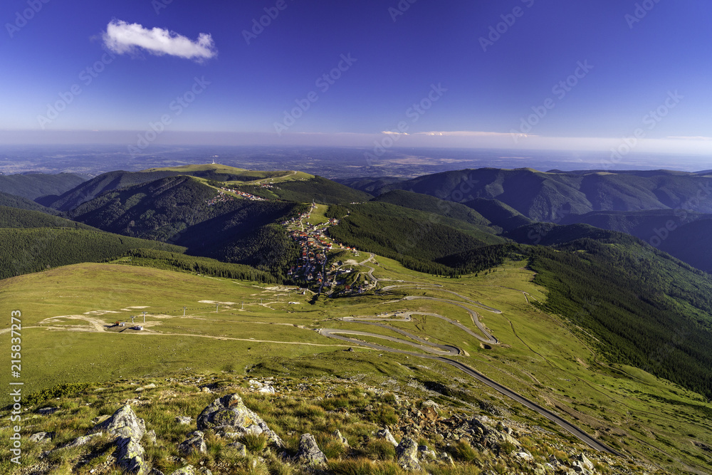 Naklejka premium Aerial view of a resort on a mountain in summer day