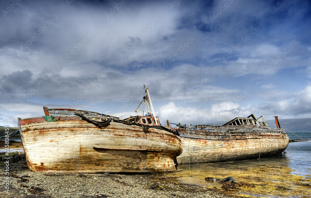 Beached fishing boats wrecks near Salen on the Isle of Mull, Inner Hebrides, Scotland 