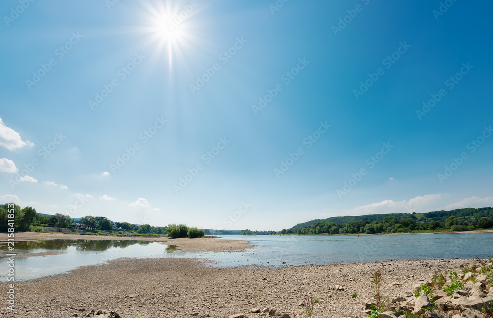 Low water level in the dried-out riverbed of the river Rhine, North Rhine-Westphalia, Germany Low water level in the dried-out riverbed of the river Rhine, North Rhine-Westphalia, Germany