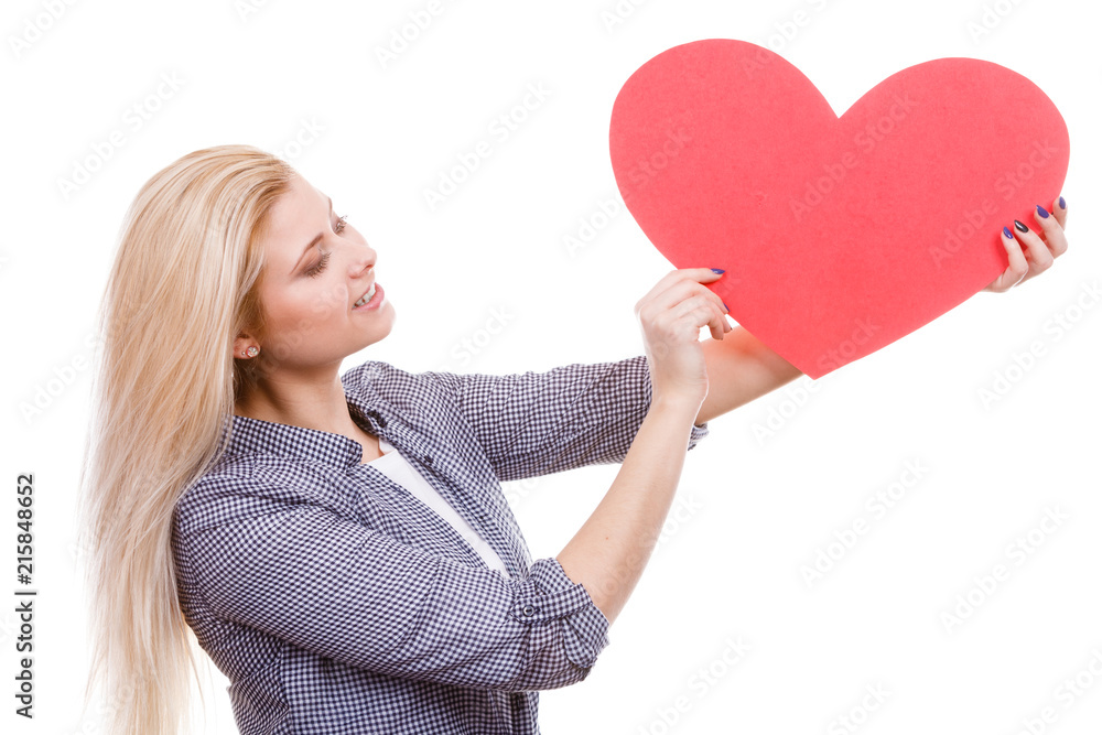Woman holding big red heart, love sign Woman holding big red heart, love sign