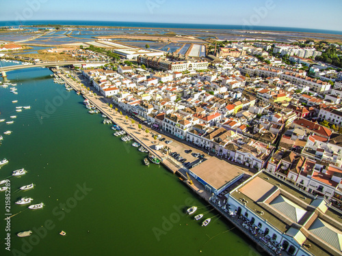 Portugal. Vista a erea de Tavira en el Algarve con canal y casas
