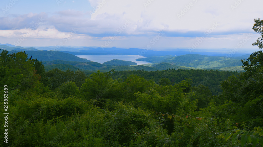 A mountain lake from an overlook. A mountain lake from an overlook.