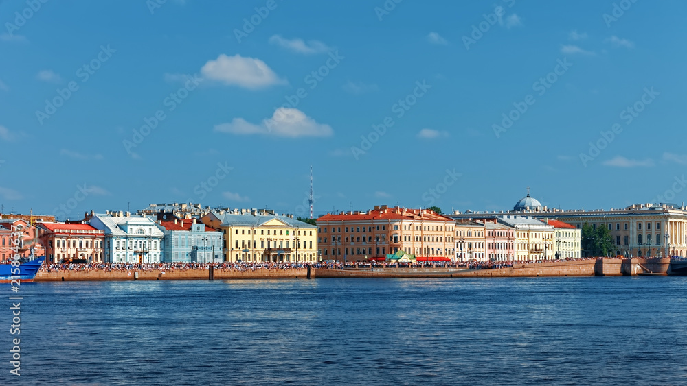 Embankment on the Neva River on a summer sunny day in St. Petersburg in Russia