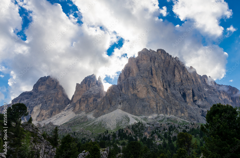 Sassolungo and Sassopiatto mountains, Italy. Photo from a hiking path in Dolomites, Dolomiti, Sella Alto Adige, South Tyrol Sassolungo and Sassopiatto mountains, Italy. Photo from a hiking path in Dolomites, Dolomiti, Sella Alto Adige, South Tyrol
