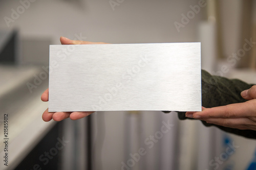 metal plate in hand