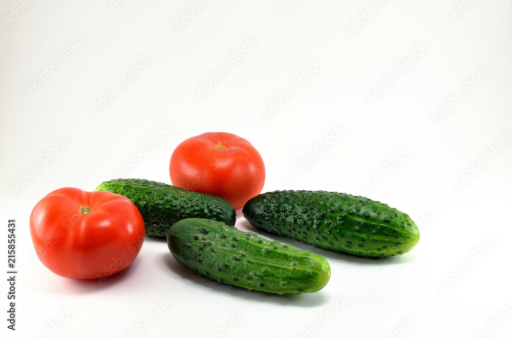 Ripe red tomatoes and cucumbers from the garden. Ripe red tomatoes and cucumbers from the garden.