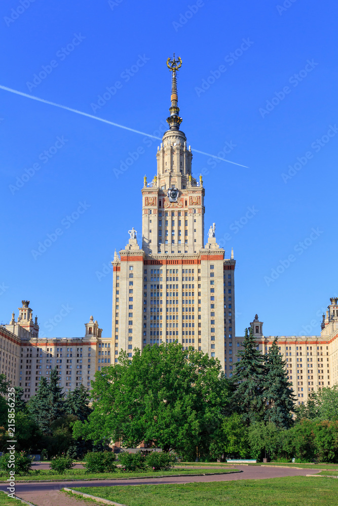View of Lomonosov Moscow State University (MSU) against blue sky in sunny summer evening