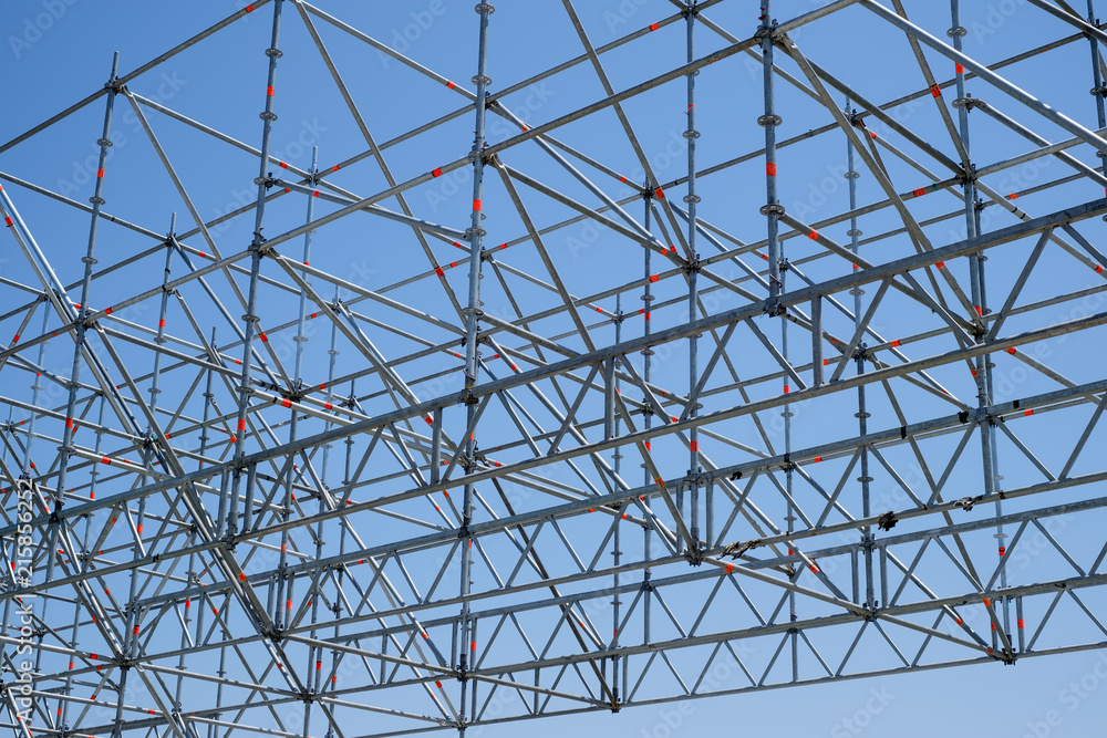 part of modern scaffolding at a construction site part of modern scaffolding at a construction site