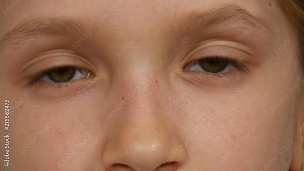Sad, Unhappy Child Face Looking in Camera, Bored Girl Green Eyes Portrait 4K Sad, Unhappy Child Face Looking in Camera, Bored Girl Green Eyes Portrait 4K