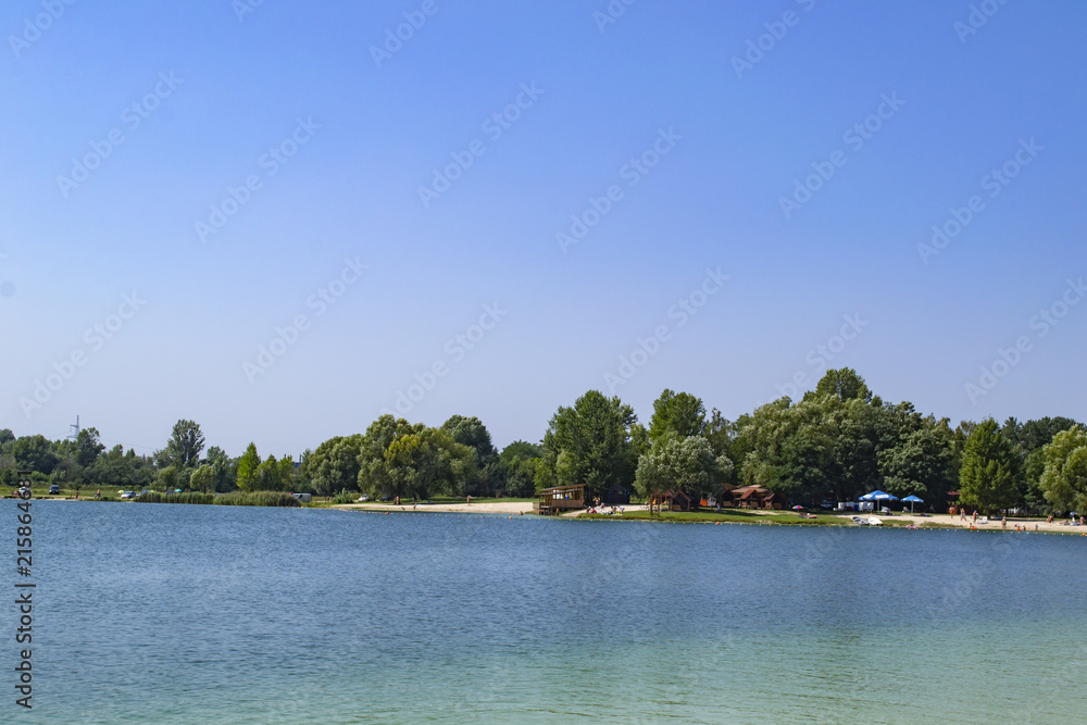 Beautiful blue lake. Summer landscape. The beauty of nature.
