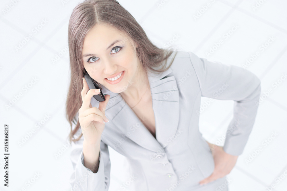 view from the top. successful business woman with a mobile phone view from the top. successful business woman with a mobile phone