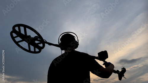Man Holding Metal Detector #2