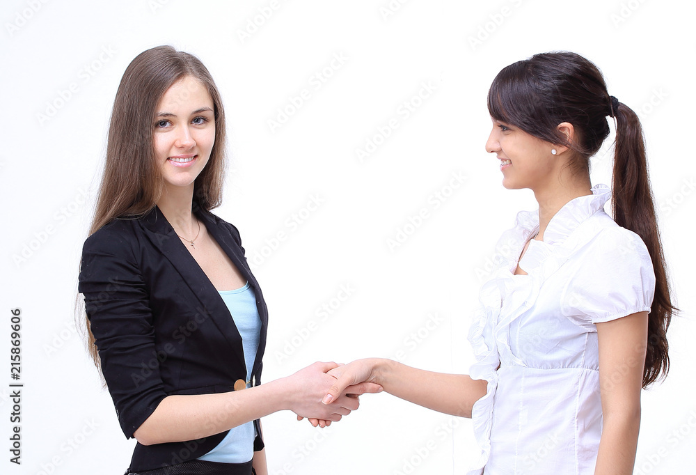 handshake of two young business partners.isolated on white. handshake of two young business partners.isolated on white.