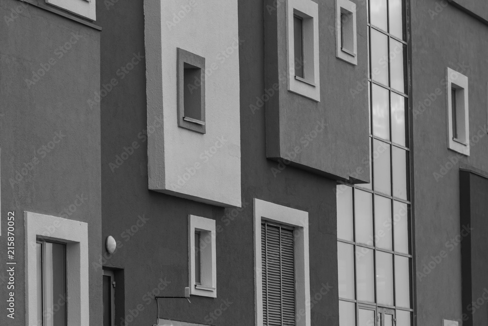 The wall of a modern building. Urban environment. Gray city The wall of a modern building. Urban environment. Gray city