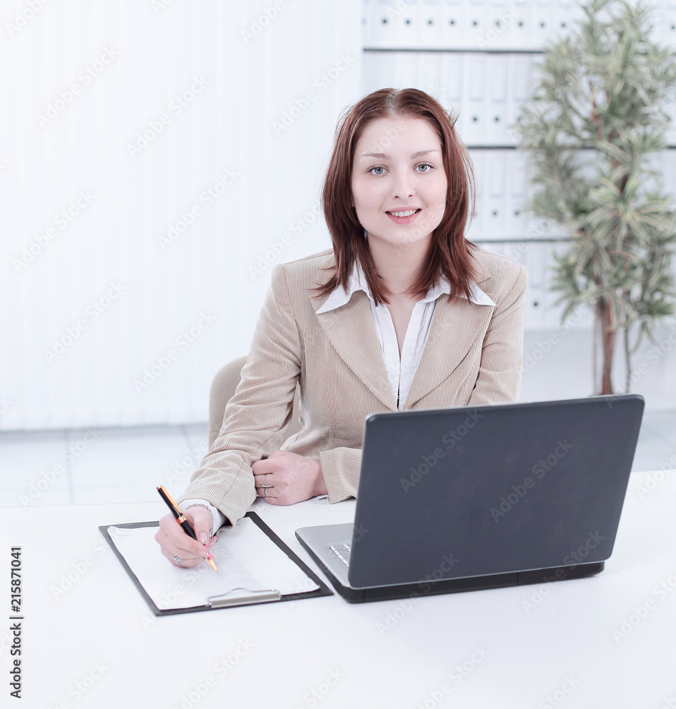 Executive business woman writing on a blak sheet. Executive business woman writing on a blak sheet.