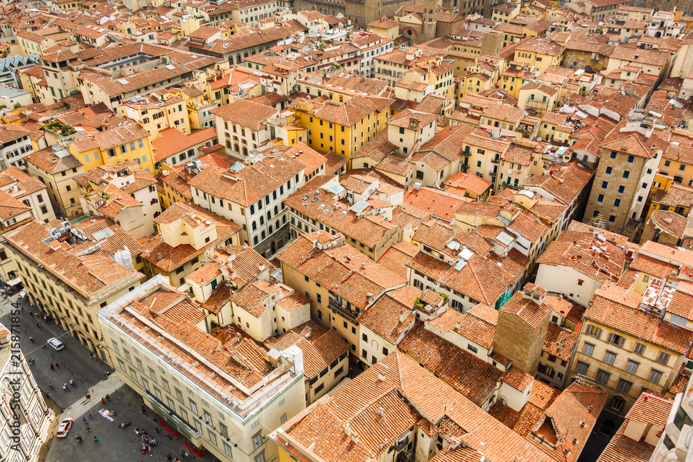 Cityscape from height, roofs of red tiles and narrow streets of Florence, Italy