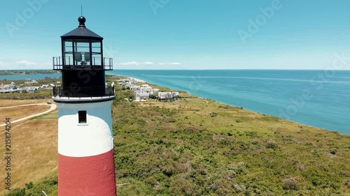 Aerial drone shot of a coastal lighthouse on Nantucket island in Massachusetts. photo