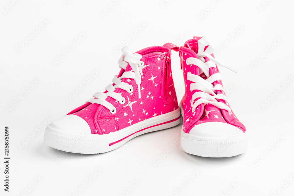 Red children's shoes. On white background. Red children's shoes. On white background.