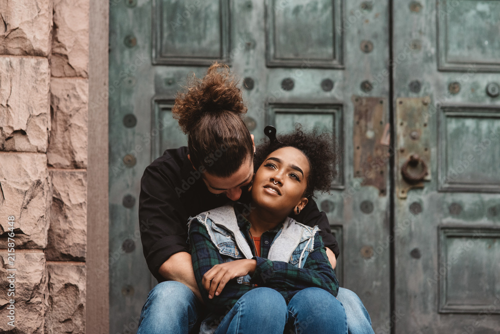 Portraits of a diverse couple in their twenties Portraits of a diverse couple in their twenties
