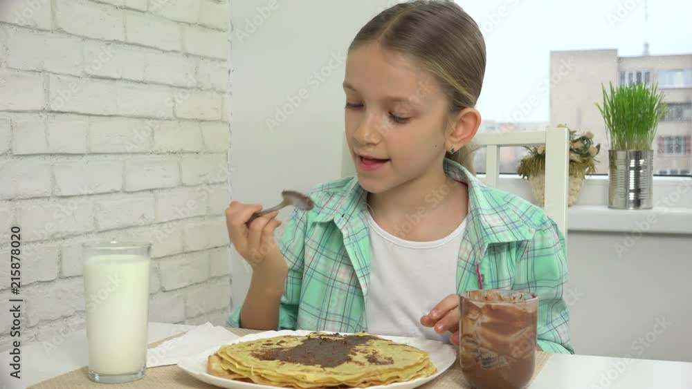 Child Preparing Pancakes at Breakfast, Girl Eating Chocolate in Kitchen 4K Child Preparing Pancakes at Breakfast, Girl Eating Chocolate in Kitchen 4K