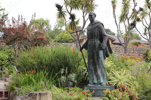 фотографія Bronze Statue of Saint Father Junipero Serra in the gardens of the Carmel Missio