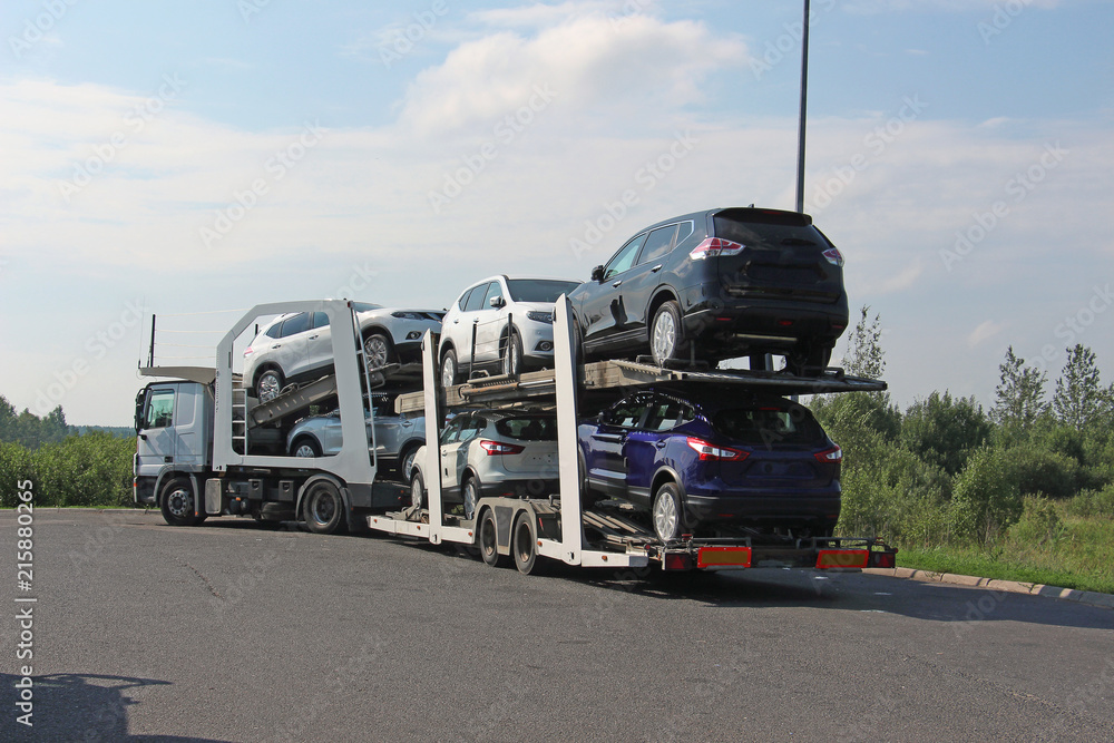 transportation of new cars on a road train