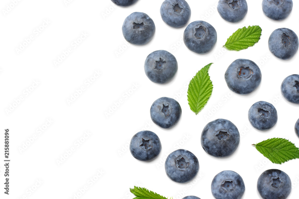 healthy background. blueberries with leaves isolated on white background. top view