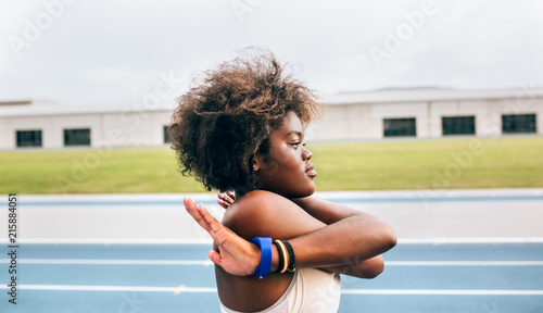 Black athlete woman in an athletics stadium